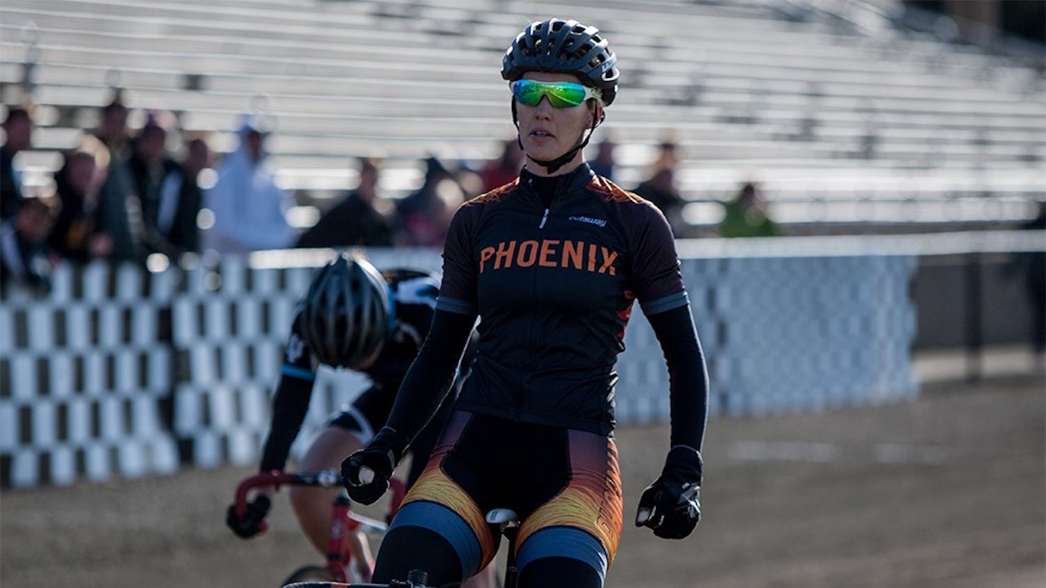 Senior Tabitha Sherwood of Phoenix Cycling sits up in the saddle after winning Miss N Out on Saturday at Bill Armstrong Stadium.