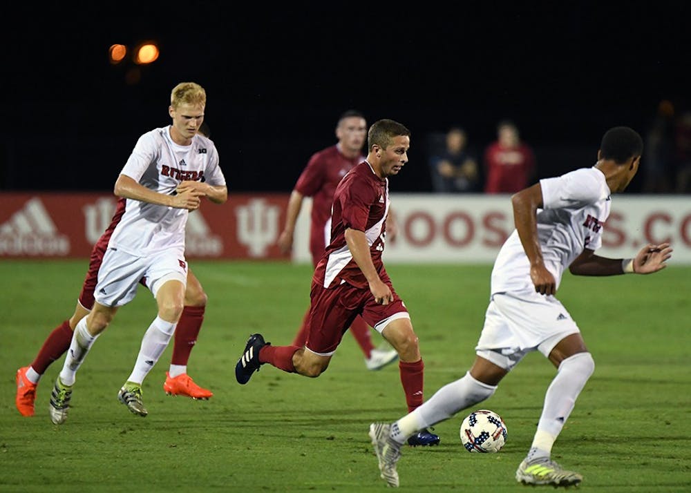 Junior defender Rece Buckmaster dribbles the ball against Rutgers at Bill Armstrong Stadium. IU defeated Rutgers, 5-0, earning their first Big Ten home win of the season.