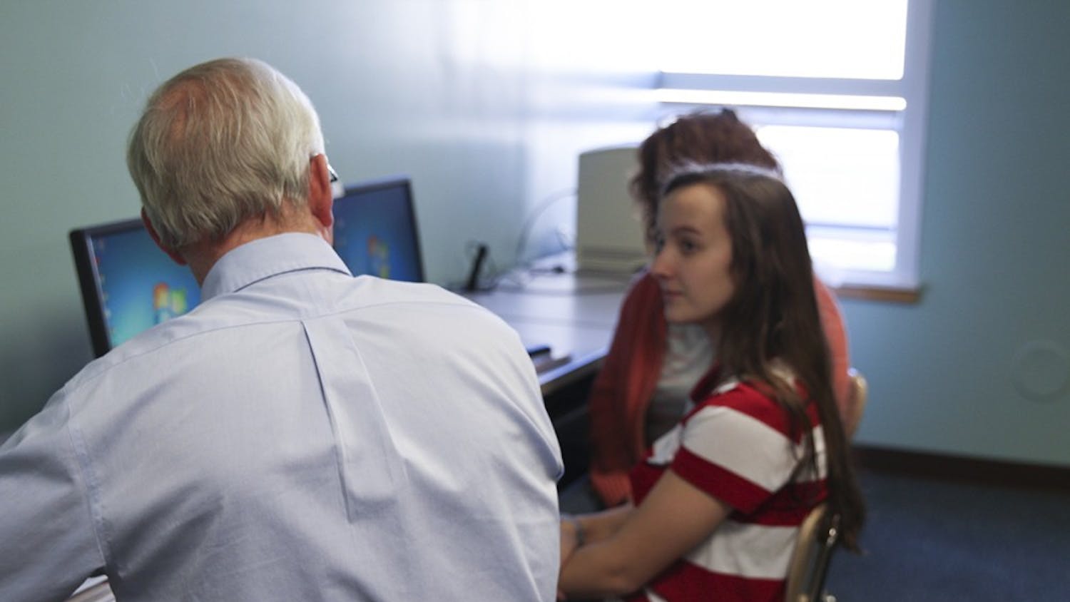 FAFSA workshop volunteer Dave Murray sits down with Alexis and Nan Shelton to go over colleges based on their finances. Alexis is looking to become an astronomer and wants to go to IU. Murray suggested IU-Southeast is her best option financially even though it doesn't have the degree she wants.