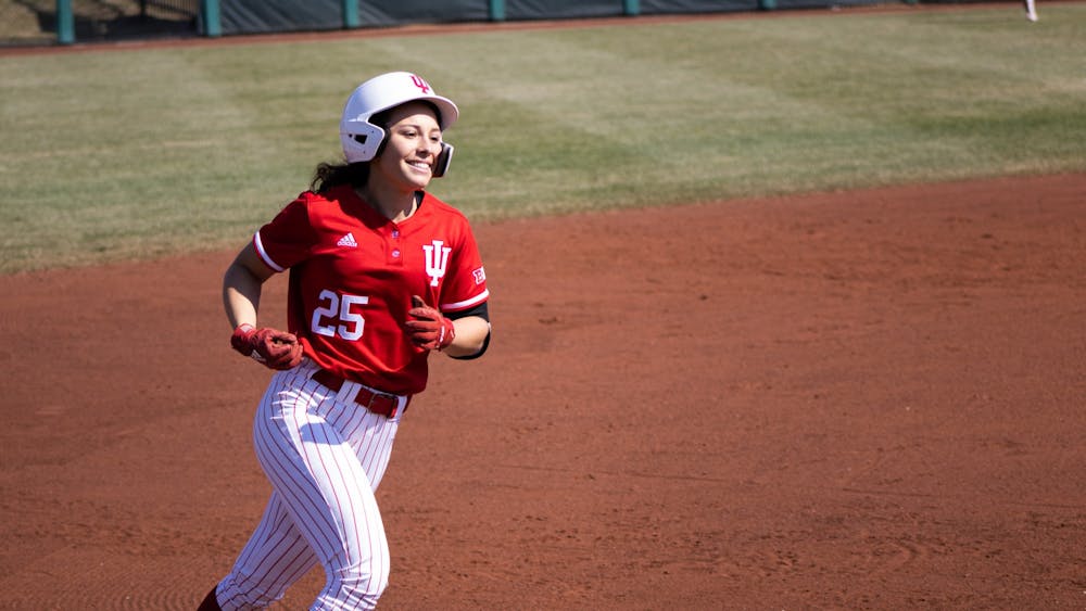 Junior outfielder Cora Basset rounds the bases after hitting her first of two home runs against Western Illinois University on March 5, 2022. Indiana beat Kent State University 14-11 Wednesday afternoon.