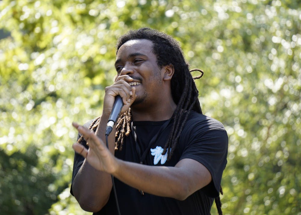 <p>IU graduate and SoundCloud hip-hop and rap artist Rex Avant performs his original tracks at the Hoosiers Helping Houston event Wednesday afternoon at Dunn Meadow. Hoosiers Helping Houston is a fundraising event put on by the Helping Hoosiers organization with proceeds going to the victims of Hurricane Harvey this year.&nbsp;</p>