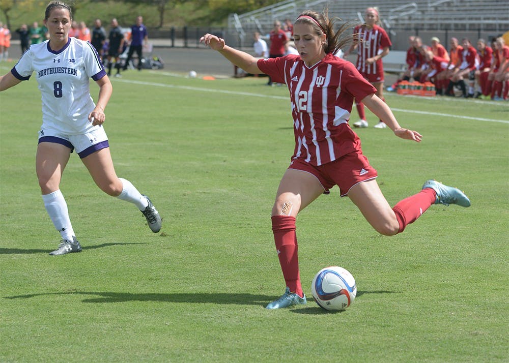 Senior midfielder Jessie Bujouves strikes the ball during the game against Northwestern University on Sunday afternoon at Bill Armstrong Stadium. IU tied the game 1-1. 