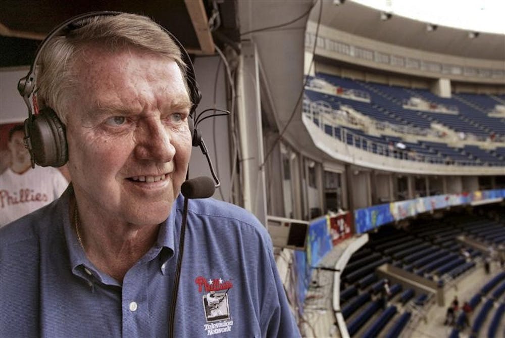 In this July 2, 2002 file photo, Philadelphia Phillies announcer Harry Kalas looks out over Veterans Stadium in Philadelphia before the start of the New York Mets-Phillies game.  Kalas, who punctuated innumerable home runs with his "Outta Here!" call, died Monday after being found in the broadcast booth before a game against the Washington Nationals. He was 73. 