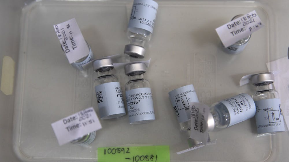 Vials of the Johnson &amp; Johnson COVID-19 vaccine lie on a table Feb. 18 at Klerksdorp Hospital in South Africa. Moderna, Pfizer and Johnson &amp; Johnson are the first three manufacturers to have COVID-19 vaccines on the market. 