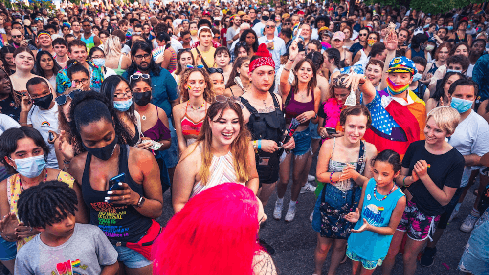 The crowd at Pridefest watches drag performer Arachna on Aug. 28, 2021, during one of the event&#x27;s two drag shows. This year, Pridefest will take place Aug. 27 on Kirkwood Avenue. 