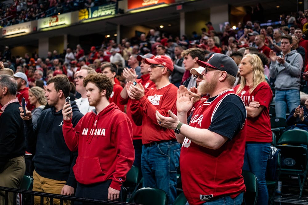 <p>IU fans cheer as the men&#x27;s basketball team takes the court March 11 at Bankers Life Fieldhouse. IU played Nebraska in the first round of the Big Ten Tournament.</p>