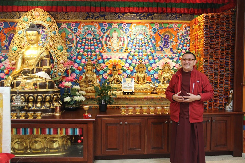 Geshe Kunga La teaches visitors about Buddhist traditions. He is a monk at the Kumbum Chamtse Ling Monastery and dedicates his life to studying and living Buddhist teaching.