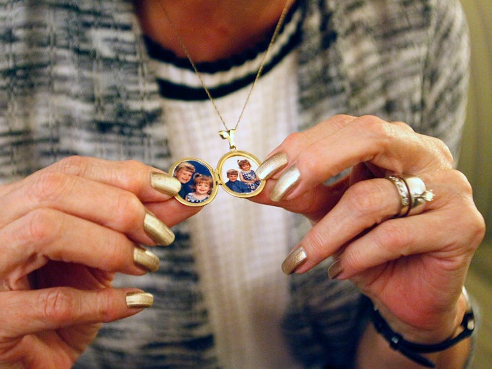 Janice Renn, mother of Kim Camm, now wears her daughter’s locket with photos of her grandchildren Brad and Jill. Kim, 35, Brad, 7, and Jill, 5, were murdered in their southern Indiana home on Sept. 28, 2000. Within 72 hours, Kim’s husband, David Camm, was arrested for the murders. Camm was convicted twice, but was acquitted after a third trial on Oct. 24.