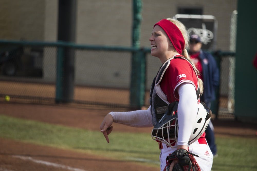 <p>Freshman catcher Maddie Westmoreland yells to the outfield in the final inning of IU’s game on March 18 against the University of Illinois at Chicago. Westmoreland and teammate Tara Trainer earned Big Ten weekly honors after sweeping Penn State.&nbsp;</p>