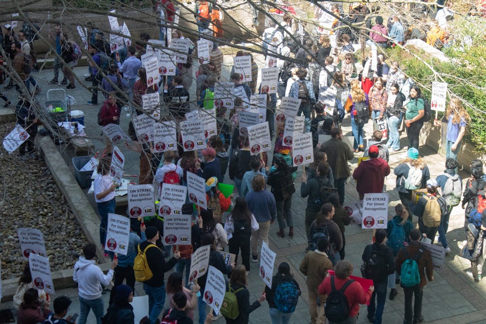 <p>Students march at one of Indiana Graduate Workers Coalition-United Graduate Workers rallies April 14, 2022, around Ballantine Hall&#x27;s courtyard. Nearly 2,000 faculty members voted on resolutions supporting the strike. </p><p><br/><br/></p>