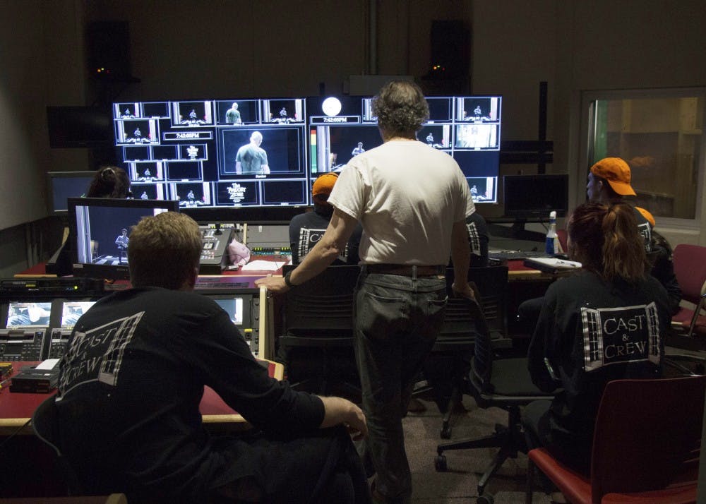 Senior lecturer Steve Krahnke assists students in his Twilight Zone course in the control room. The course, which is part of the College of Arts + Sciences Themester programming, recreated three episodes of Rod Serling’s 1960s-era TV series "The Twilight Zone".