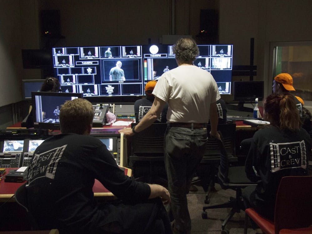 Senior lecturer Steve Krahnke assists students in his Twilight Zone course in the control room. The course, which is part of the College of Arts + Sciences Themester programming, recreated three episodes of Rod Serling’s 1960s-era TV series "The Twilight Zone".