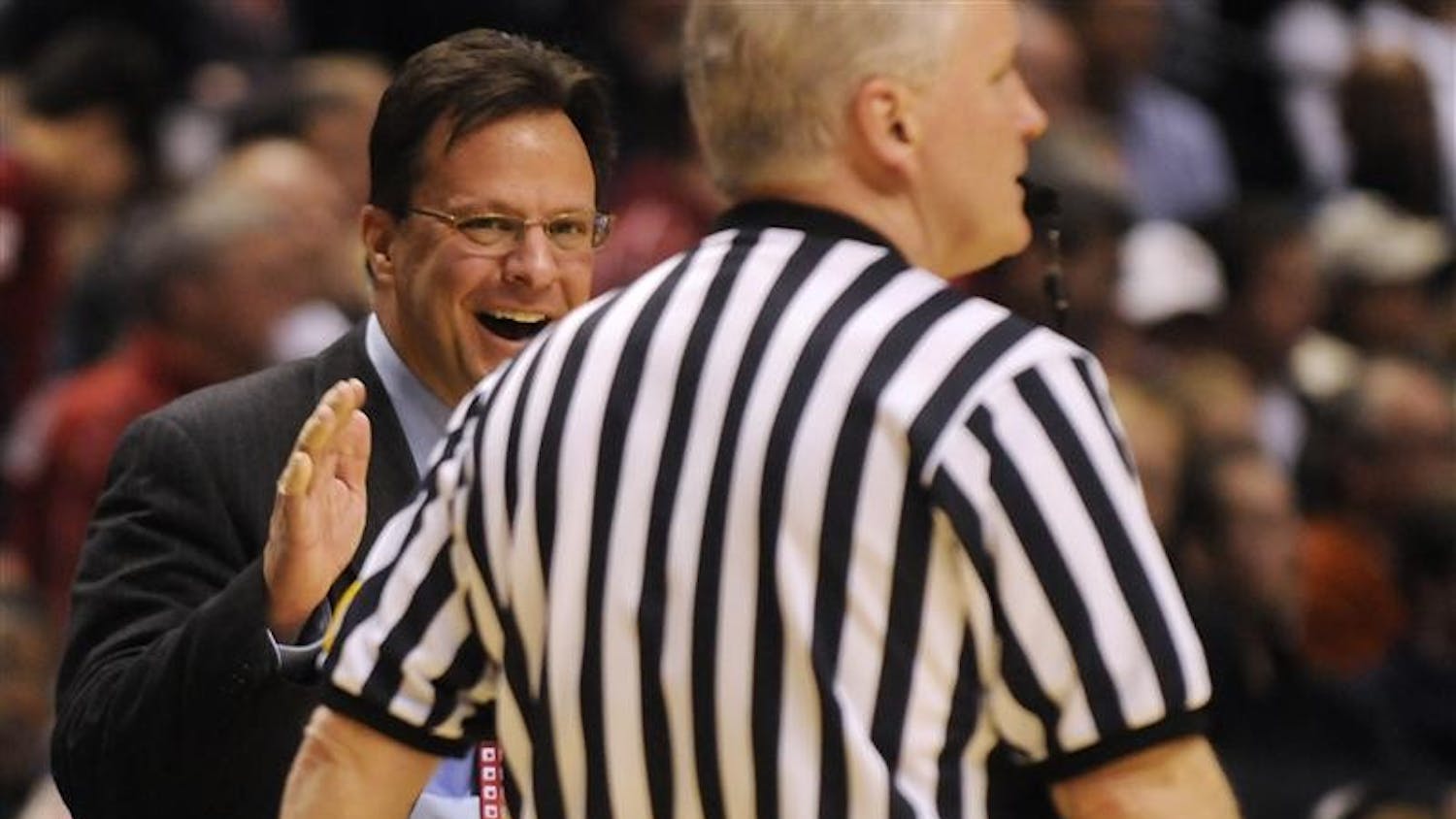 IU coach Tom Crean laughs and claps at a referee during the second half of IU's 66-51 loss to Penn State in the first round of the Big Ten Tournament on Thursday at Conseco Fieldhouse in Indianapolis. Crean was called for a technical foul in the first half after yelling at a referee. "It's completely personal," Crean yelled at one referee in the second half.