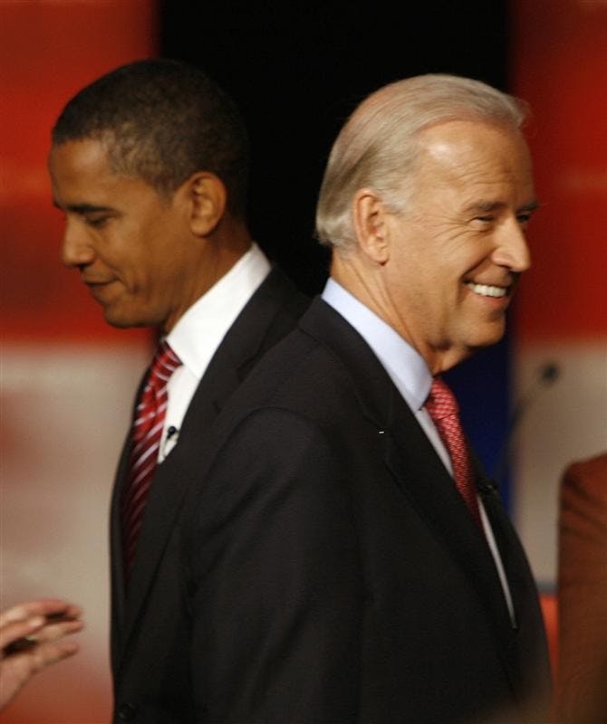 Democratic presidential hopefuls from left, Sen. Barack Obama, D-Ill., and Sen. Joseph Biden, D-Del., are seen on stage at a debate at Dartmouth College on Wednesday, Sept. 26, 2007, in Hanover, N.H. Obama picked Biden as his running mate late Friday night.