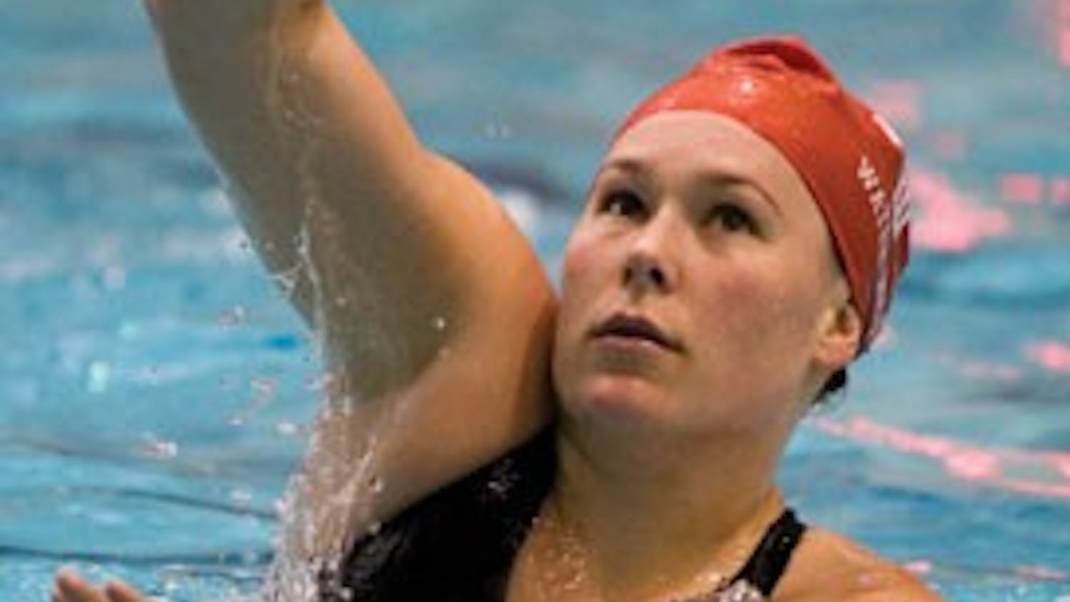 A member of the IU water polo team practices Feb. 9 in the Counsilman-Billingsley Pool at the SRSC.