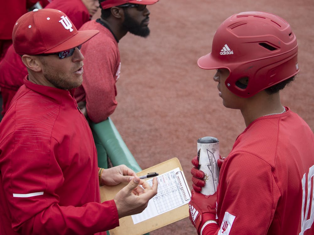 Then-sophomore infielder Justin Walker talks to IU baseball head coach Jeff Mercer at Bart Kaufman Field on April 28, 2019. Indiana earned an important series win against Minnesota this past weekend.