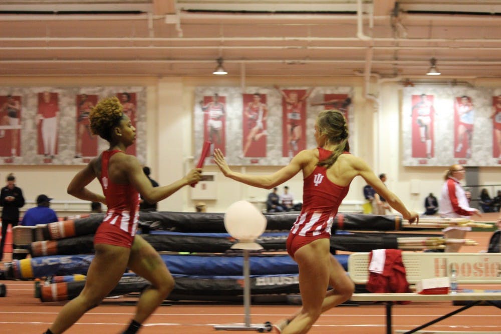 <p>Junior sprinter Jaela Gay hands off the baton in third lap of the 4x400-meter dash to sophomore distance runner Mallory Mulzer. The Hoosiers will compete in the Big Ten Championships this weekend in Geneva, Ohio.</p>