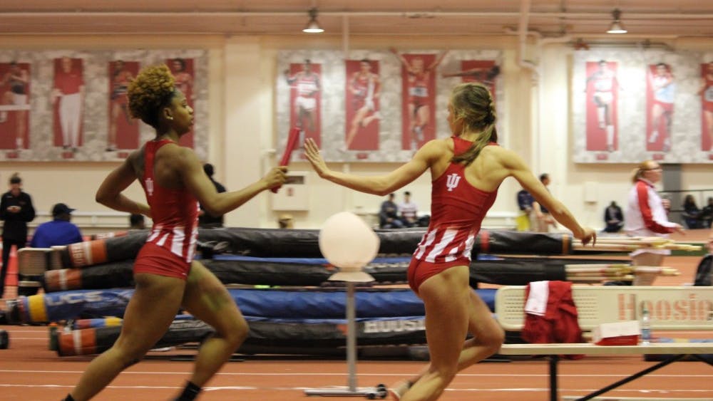 Junior sprinter Jaela Gay hands off the baton in third lap of the 4x400-meter dash to sophomore distance runner Mallory Mulzer. The Hoosiers will compete in the Big Ten Championships this weekend in Geneva, Ohio.