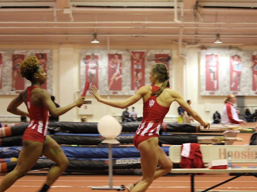 Junior sprinter Jaela Gay hands off the baton in third lap of the 4x400-meter dash to sophomore distance runner Mallory Mulzer. The Hoosiers will compete in the Big Ten Championships this weekend in Geneva, Ohio.