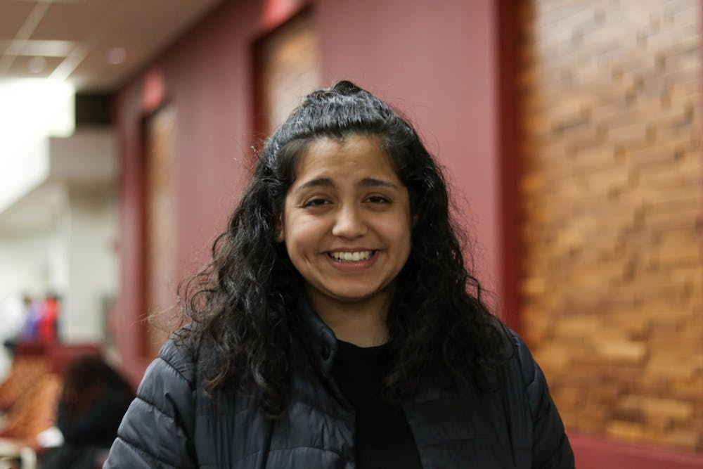 <p>Freshman Ila Das sits Feb. 4 in Wells Library. She was one of the IU students who traveled to Iowa by bus to canvass for the Bernie Sanders campaign Feb. 2.</p>