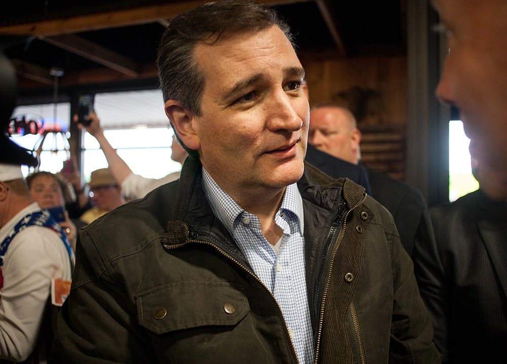 Sen. Ted Cruz speaks to supporters at Wagon Wheel Market & Deli in Bloomington, Indiana on Monday. Cruz spoke to patrons throughout the store and those whop had waited outside to see him.