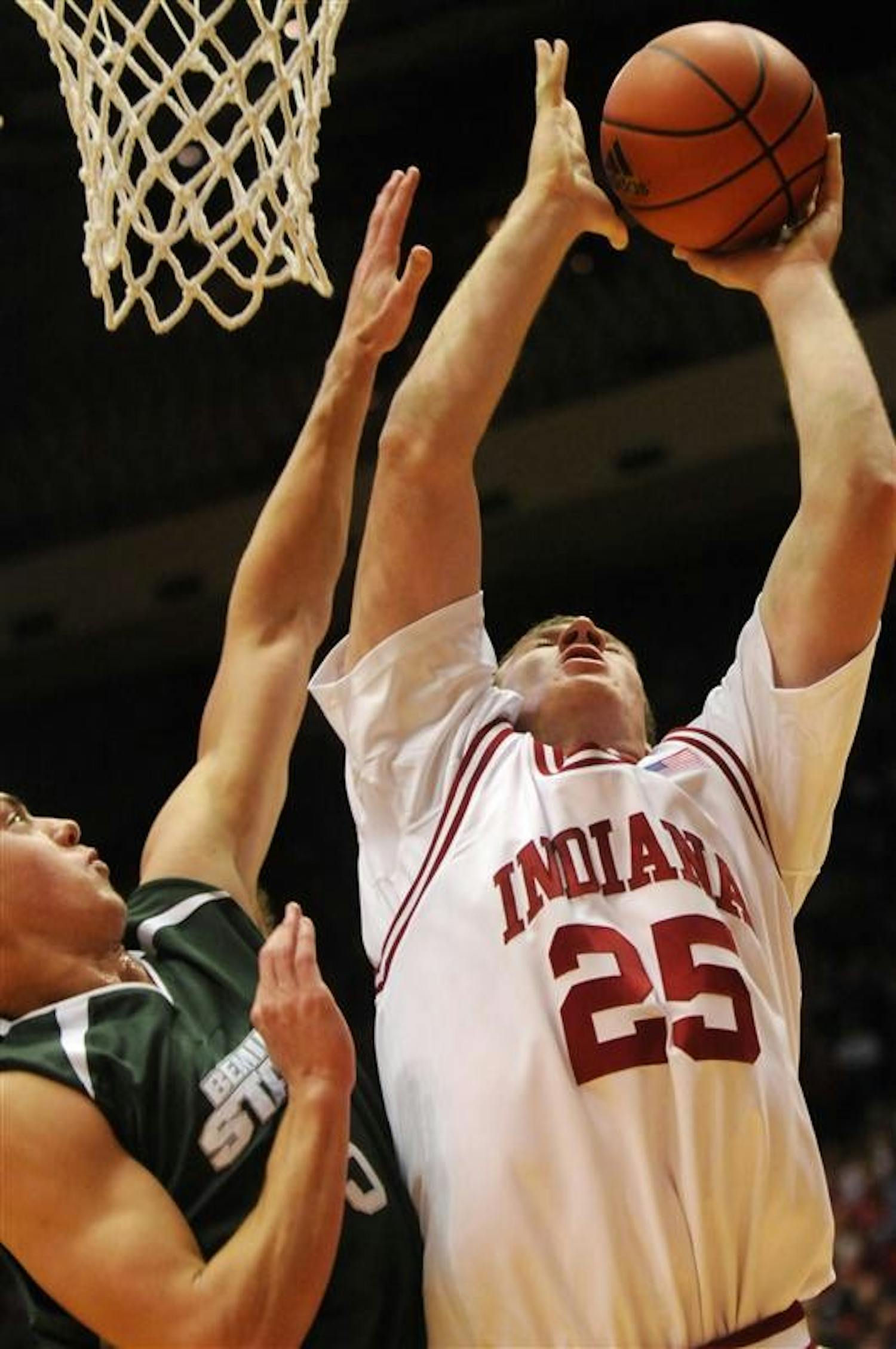 IU freshman Tom Pritchard goes up for a shot over a Bemidji State defender during a game on Tuesday night at Assembly Hall. Pritchard had 12 points in IU's 72-54 win.