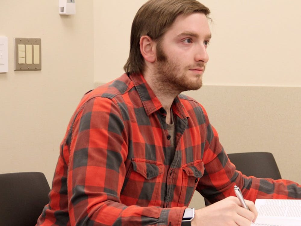 John Kummer a second-year graduate student attends a class in SPEA on Wednesday evening.