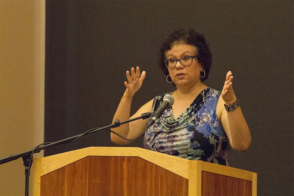Dr. Yolanda Trevino, Assistant Vice President of Diversity, Equality and Multicultural Affairs, talks about the search for a new director of the  at the State of the Neal-Marshall Black Culture Center on Tuesday night. Trevino explained that the director search is ongoing.