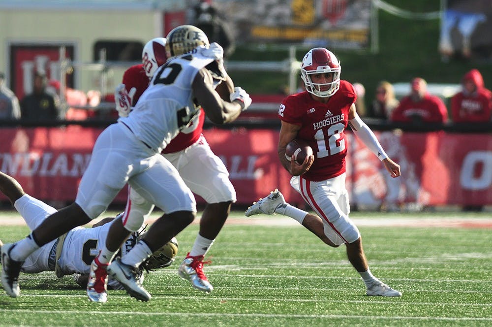 Junior quarterback Zander Diamont runs the ball on Saturday at memorial stadium. Diamont announced after the game that he will not return to football.