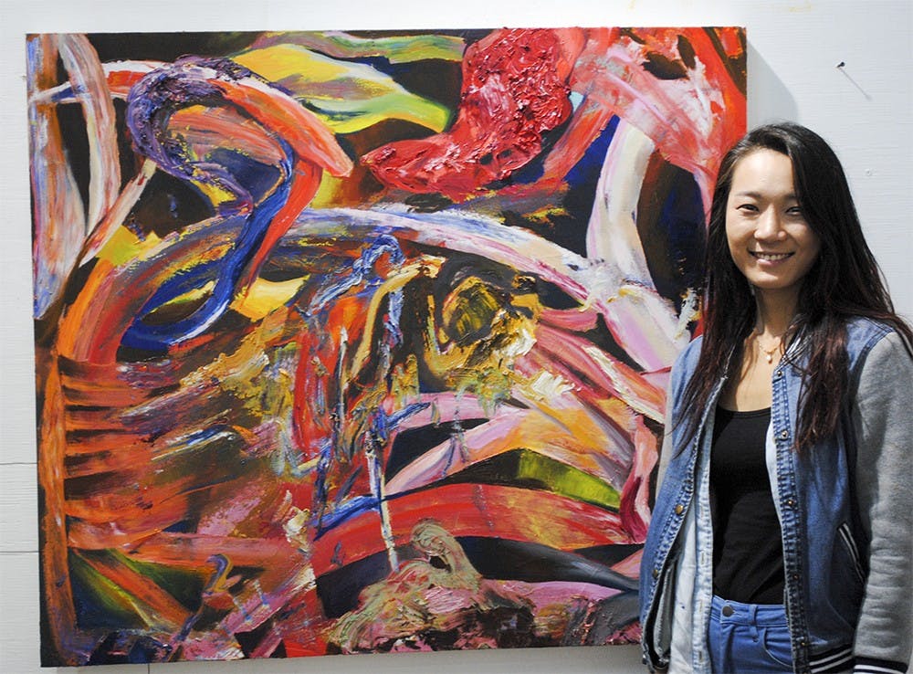 IU student Won-Hee Parkby shows of her art work. Parkby is a BFA student in painting, but has recently found joy in ceramics. 
