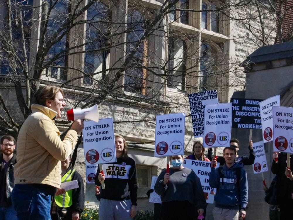 Demonstraters listened to multiple speakers and music April 14, 2022, outside Sample Gates. Mutiple picket lines are taking place outside IU buildings starting this week as the graduate workers look to be recognized as a union and fight for higher wages.