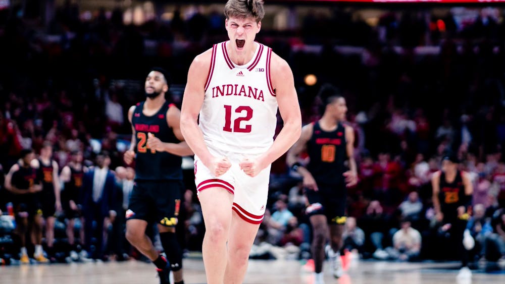 Graduate senior forward Miller Kopp celebrates after the game on March 10, 2023, at the United Center in Chicago. Indiana takes on Kent State on Friday.