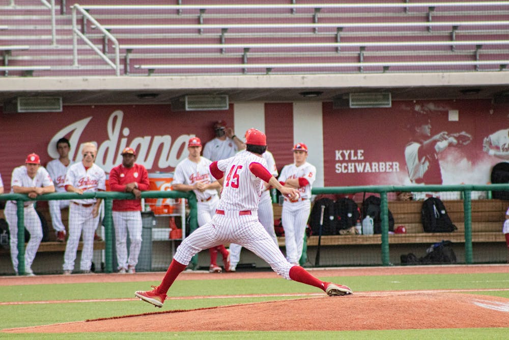 <p>Then-freshman pitcher John Modugno pitches against Illinois on April 10, 2021, at Bart Kaufman Field. Indiana will open their season at 4 p.m. Feb. 18 at Clemson University. </p>