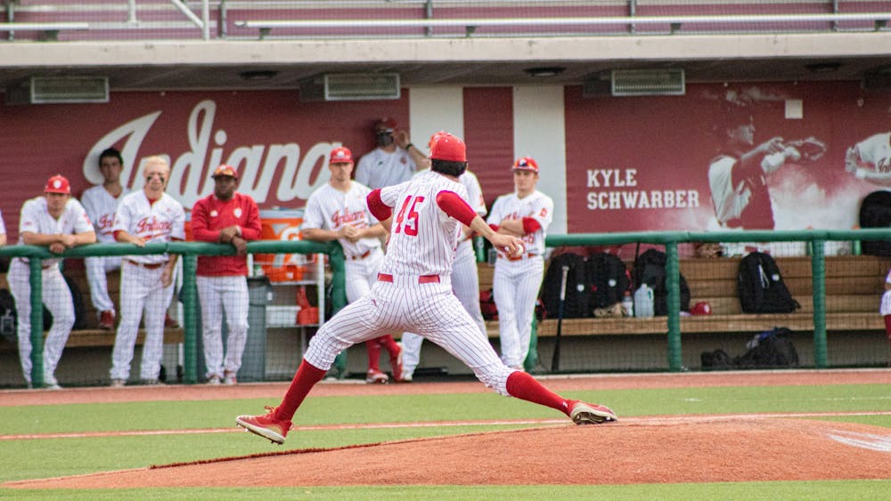 Then-freshman pitcher John Modugno pitches against Illinois on April 10, 2021, at Bart Kaufman Field. Indiana will open their season at 4 p.m. Feb. 18 at Clemson University. 
