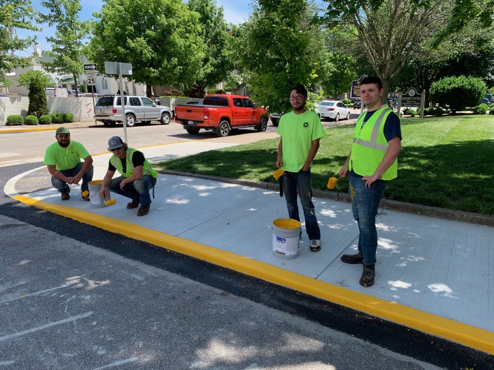 Curb Painting Crew.jpeg