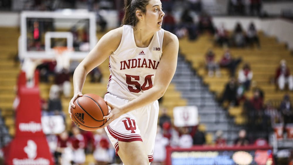 Then-junior forward Mackenzie Holmes looks to pass the ball against Southern Illinois University on Dec. 23, 2021, at Simon Skjodt Assembly Hall. The Hoosiers outscored Nebraska 12-0 in overtime on Jan. 1, 2023.