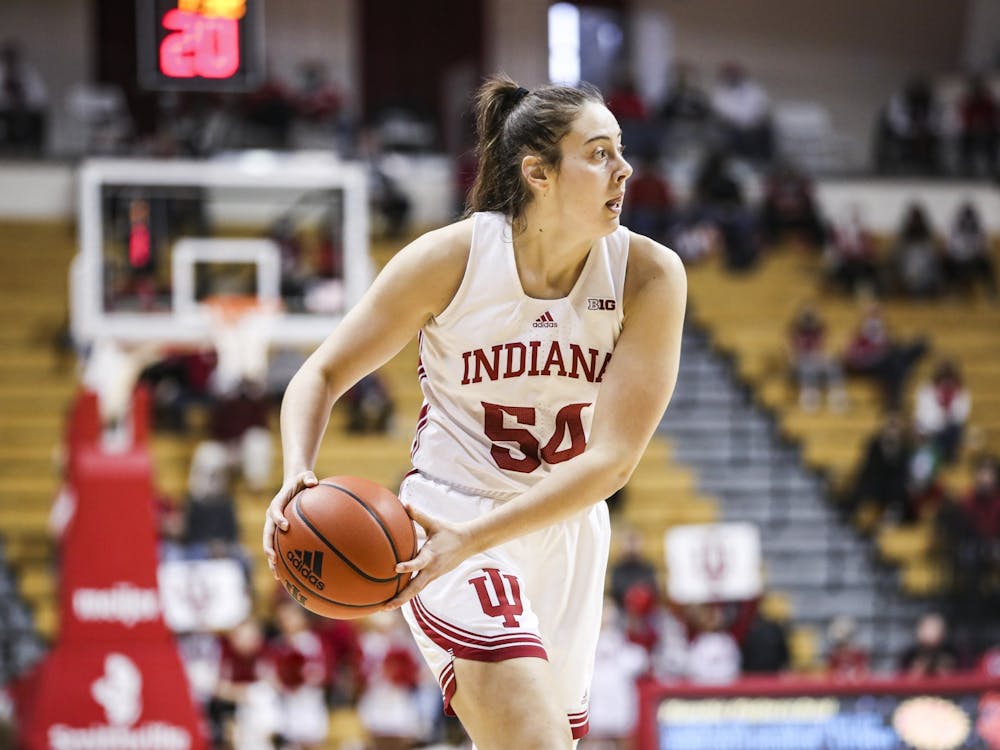 Then-junior forward Mackenzie Holmes looks to pass the ball against Southern Illinois University on Dec. 23, 2021, at Simon Skjodt Assembly Hall. The Hoosiers outscored Nebraska 12-0 in overtime on Jan. 1, 2023.