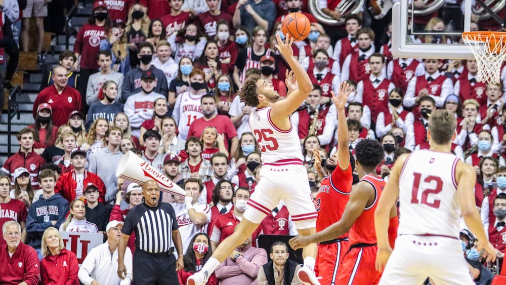 Indiana senior forward Race Thompson shoots for a basket Nov. 17, 2021, at Simon Skjodt Assembly Hall. Indiana defeated St. John&#x27;s University 76-74 at home. 