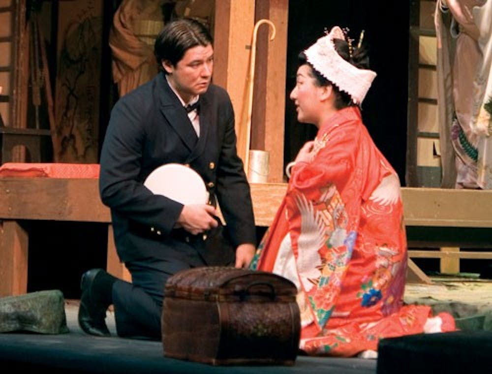 Lt. B. F. Pinkerton, U.S.N., played by Adam Diegel and Cio-Cio San (Madama Butterfly) played by Jing Zhang, perform during the dress rehearsal for Madama Butterfly Tuesday evening at the MAC. 