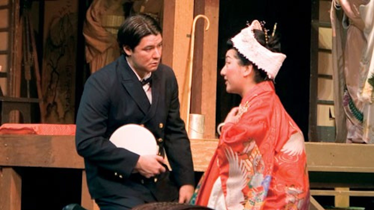 Lt. B. F. Pinkerton, U.S.N., played by Adam Diegel and Cio-Cio San (Madama Butterfly) played by Jing Zhang, perform during the dress rehearsal for Madama Butterfly Tuesday evening at the MAC. 