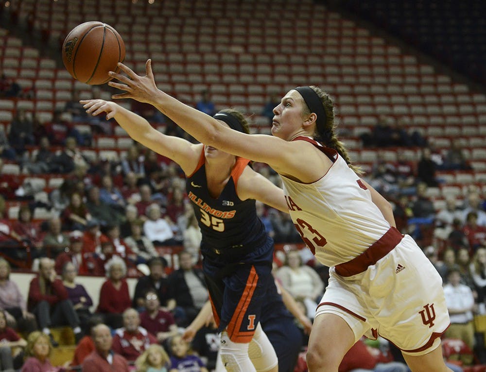 Sophomore foward Amanda Cahill goes after the loose the ball during the game against Illinois on Wednesday at Assembly Hall.