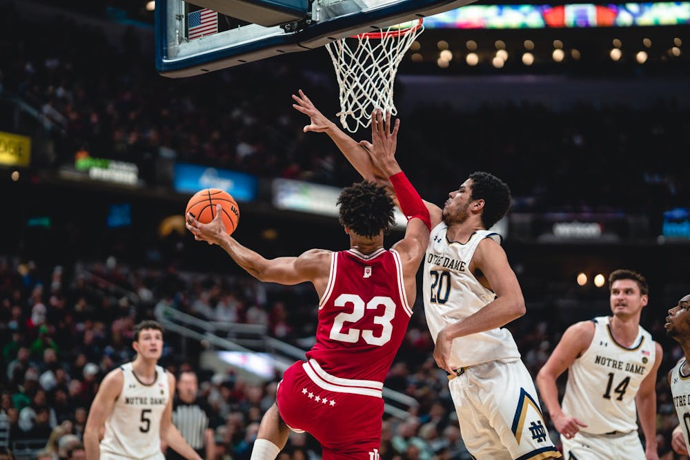 <p>Junior forward Trayce Jackson-Davis shoots the basketball during the first half of the Crossroads Classic between Indiana and Notre Dame on Dec. 18, 2021, at Gainbridge Fieldhouse in Indianapolis. The Hoosiers beat the Fighting Irish 64-56.</p>