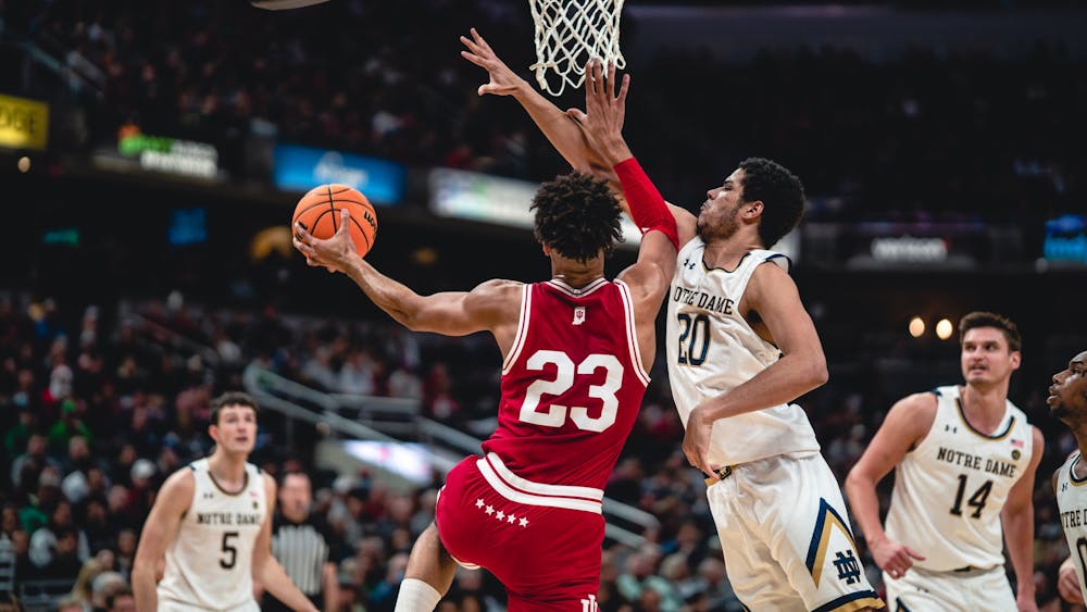 Junior forward Trayce Jackson-Davis shoots the basketball during the first half of the Crossroads Classic between Indiana and Notre Dame on Dec. 18, 2021, at Gainbridge Fieldhouse in Indianapolis. The Hoosiers beat the Fighting Irish 64-56.