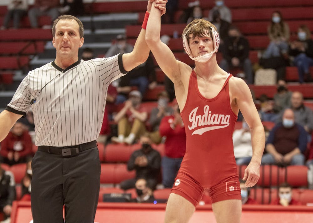 <p>Junior Graham Rooks wins his match on Jan. 29, 2022, at Wilkinson Hall. Rooks won his third consecutive match in the 149-pound class. </p>