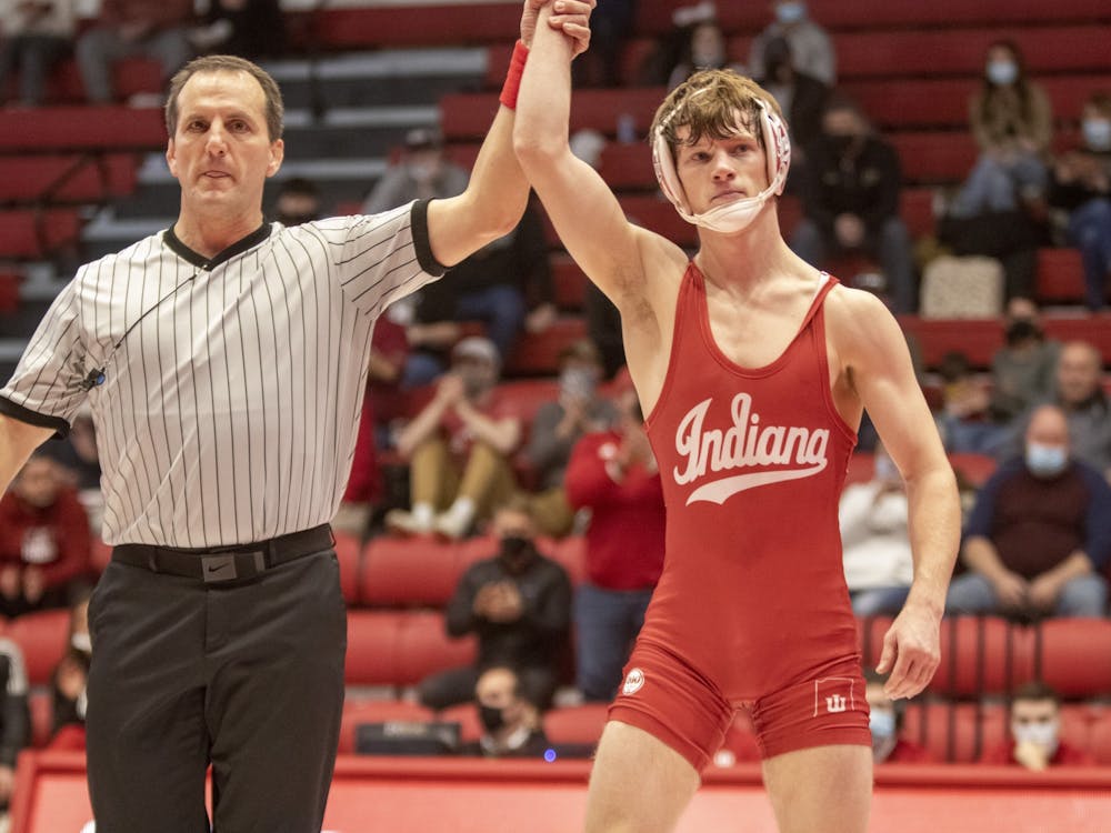 Junior Graham Rooks wins his match on Jan. 29, 2022, at Wilkinson Hall. Rooks won his third consecutive match in the 149-pound class. 