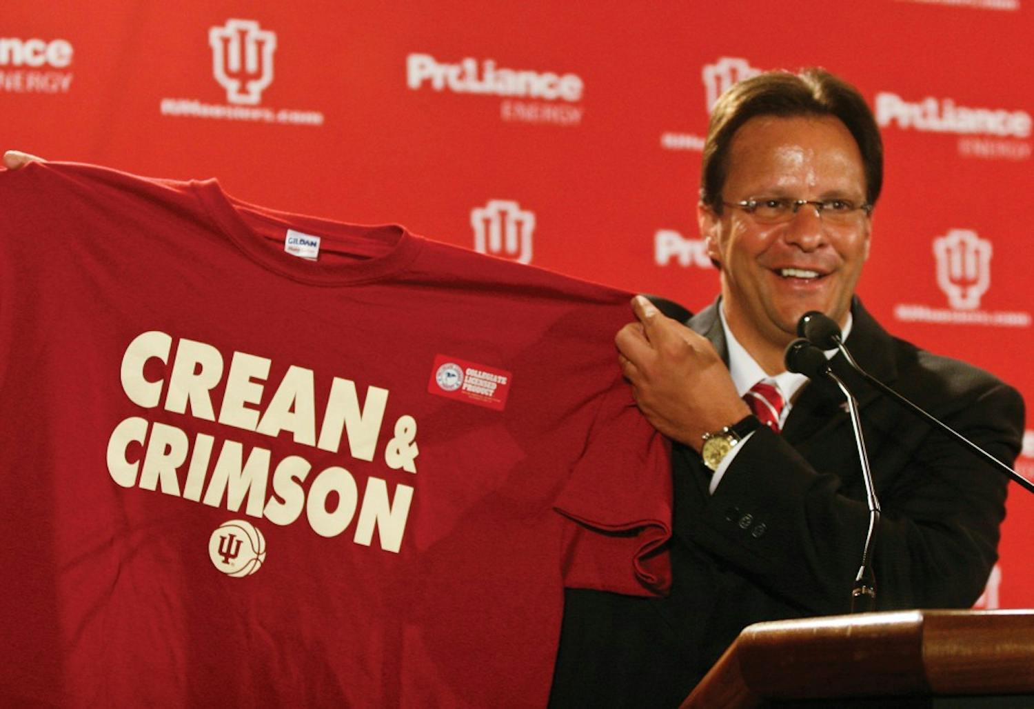 Jacob Kriese • IDS
New IU head coach Tom Crean holds a T-shirt that says "Crean & Crimson" during a press conference Wednesday afternoon in the Hoosier Room. Crean was hired Wednesday after a two week search.
