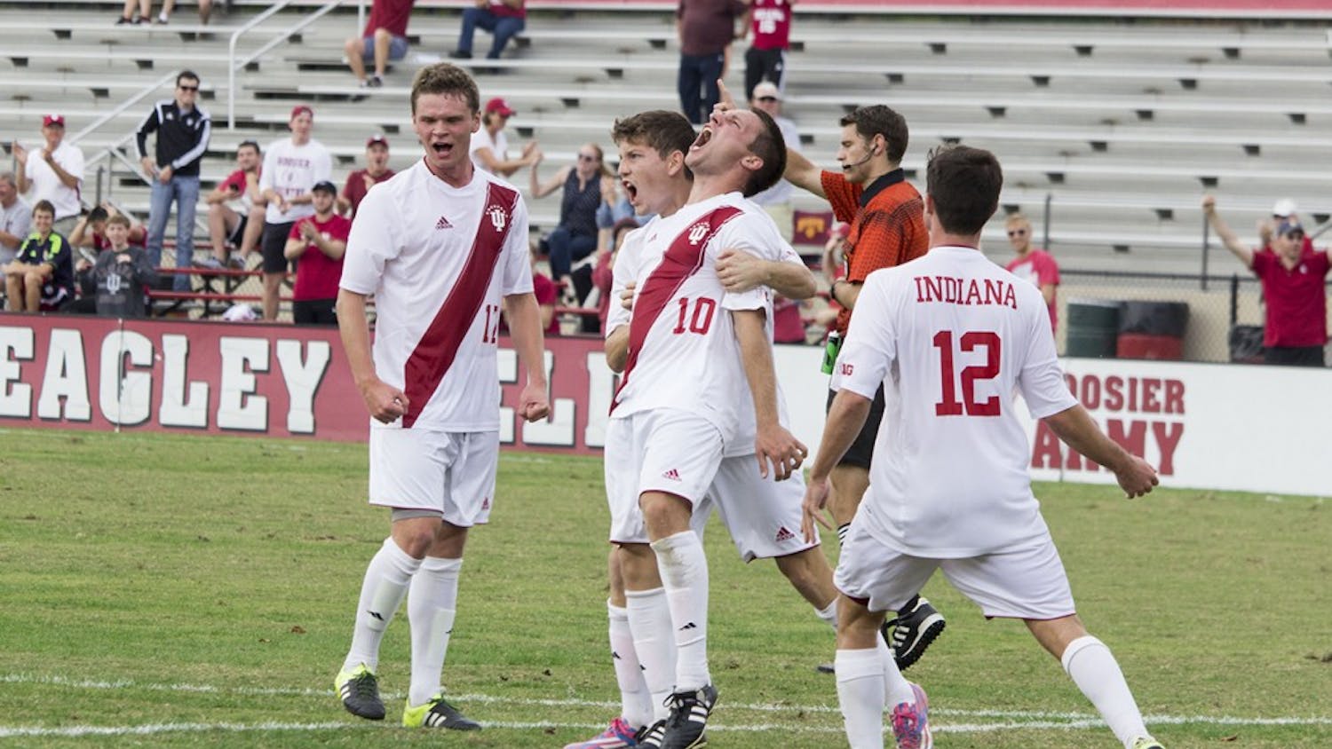 Indiana's Tanner Thompson celebrates his game winning goal with teammates in Sunday afternoon's 2-1 victory over Michigan State at Bill Armstrong Stadium.