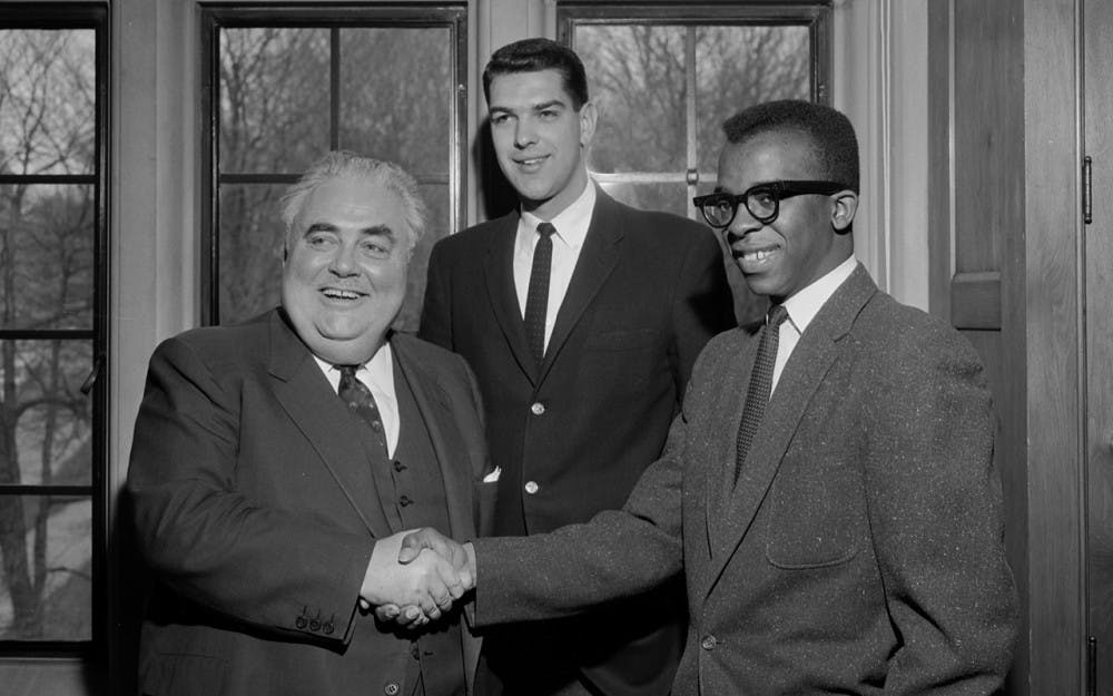 Thomas Atkins, first Black student body president in the Big Ten Conference, shakes hands with Herman B Wells after his election in 1960. Atkins would go on to serve as a Boston City Council Member and lawyer for the NAACP.