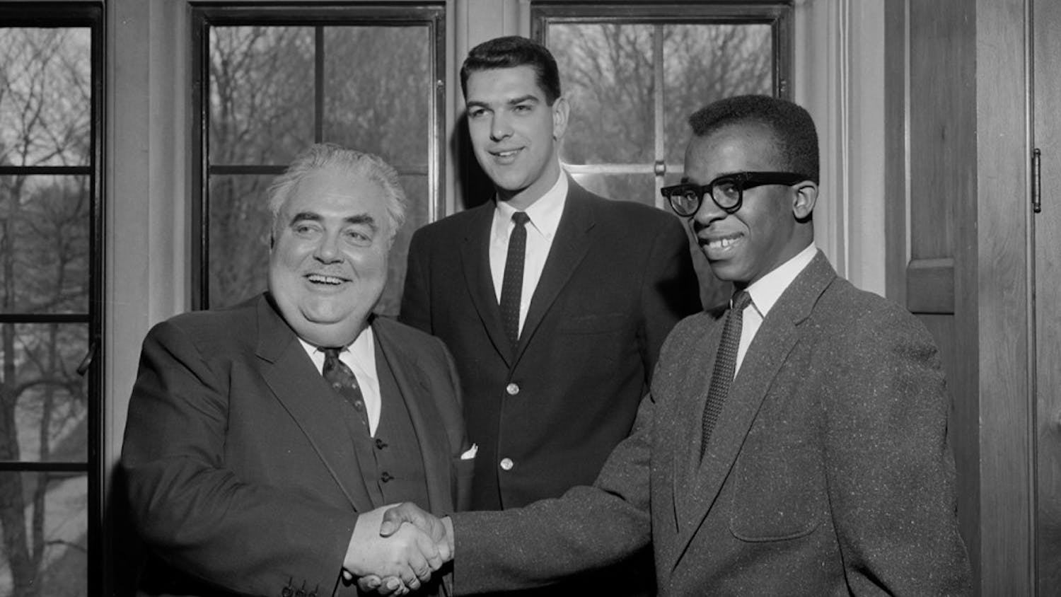 Thomas Atkins, first Black student body president in the Big Ten Conference, shakes hands with Herman B Wells after his election in 1960. Atkins would go on to serve as a Boston City Council Member and lawyer for the NAACP.