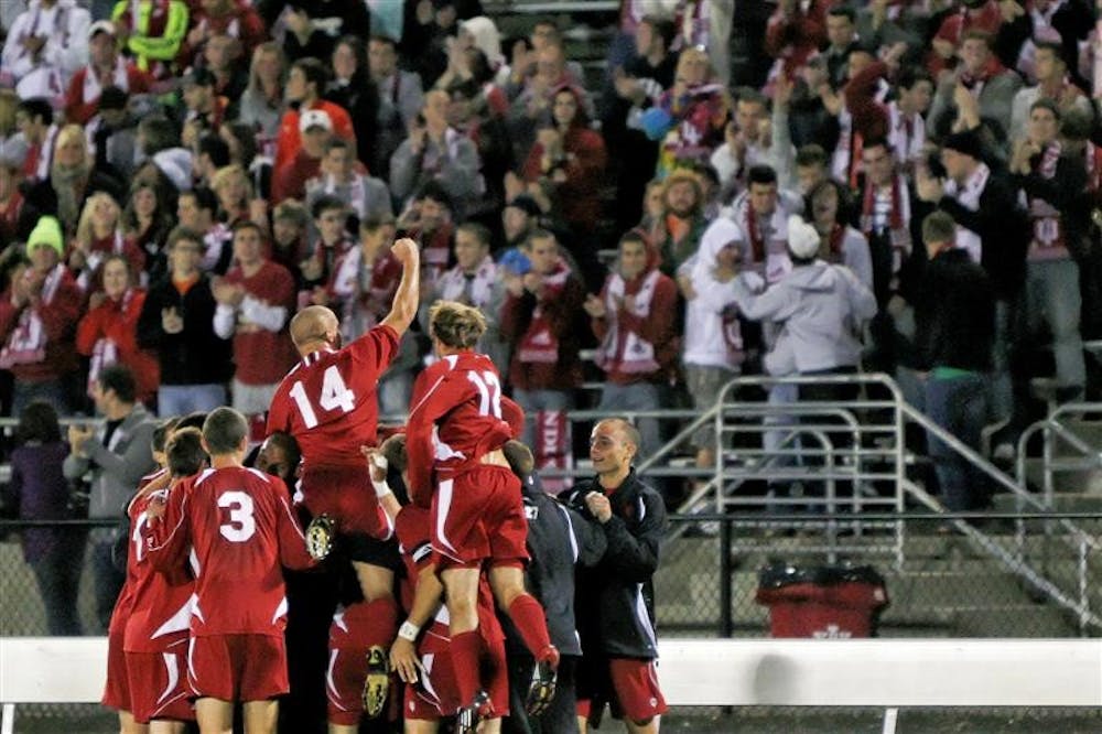 IU sophomore Neil Wilmarth salutes the crowd following his goal assist to Andy Adlard during the Hoosiers 3-1 win against No. 9 Notre Dame on Thursday night at Bill Armstrong Stadium.